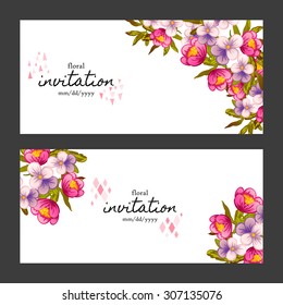 Wedding invitation cards with floral elements