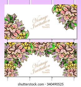 Wedding invitation cards with floral elements