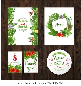 wedding invitation cards with tropical plants and flowers