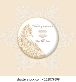 Wedding invitation decorated with bird and rings