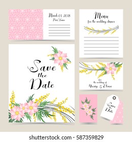 Wedding invitation decorated with mimosa and spring flowers