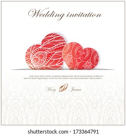 Wedding invitation decorated with red lace hearts