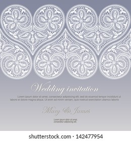 Wedding invitation decorated with white lace hearts 