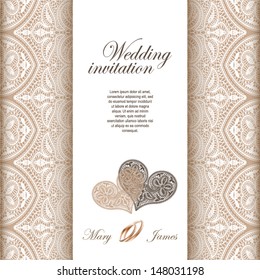 Wedding invitation decorated with white lace and hearts