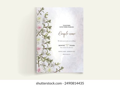 WEDDING INVITATION FRAME WITH FLOWER DECORATIONS AND FRESH LEAVES