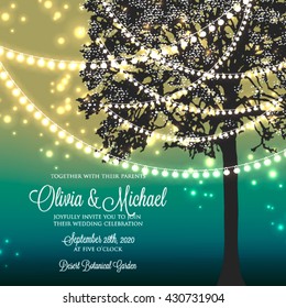 Wedding invitation with glowing lights on the tree. Garden party invitation. Inspiration card for wedding, date, birthday, tea party