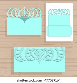Wedding invitation or greeting card with abstract ornament. Vector envelope template for laser cutting. Paper cut card with silhouette.