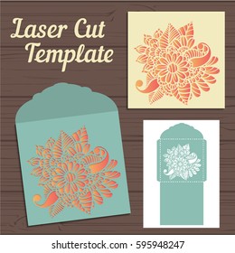 Wedding invitation or greeting card with abstract ornament. Vector envelope template for laser cutting. Paper cut card with silhouette.