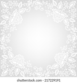 Wedding invitation or greeting card with white lace on gray background