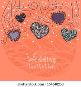 wedding invitation with hanging hearts