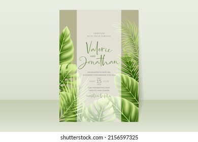 Wedding invitation template with realistic tropical summer leaves