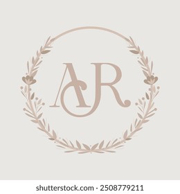 Wedding monogram crest design with AR initial surrounded by minimal floral wreath