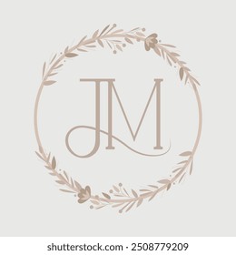 Design de crista de monograma de casamento com JM inicial cercado por grinalda floral mínima