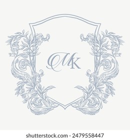 Wedding monogram crest design with MK initial surrounded by baroque style intricate motifs