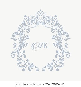 Wedding monogram crest design with MK initial surrounded by baroque style intricate motifs