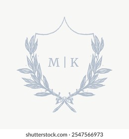 Wedding monogram crest design with MK initial surrounded by baroque style intricate motifs