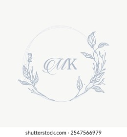 Wedding monogram crest design with MK initial surrounded by baroque style intricate motifs