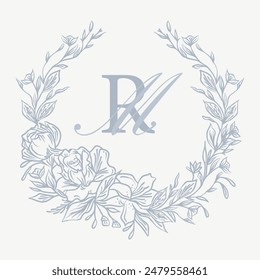 Wedding monogram crest design with RM initial surrounded by intricate floral elements