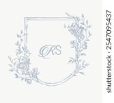 Wedding monogram crest design with RS initial surrounded by baroque style intricate motifs