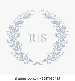 Wedding monogram crest design with RS initial surrounded by baroque style intricate motifs