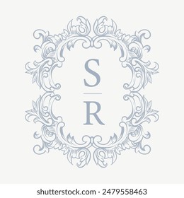 Wedding monogram crest design with SR initial surrounded by baroque style intricate motifs