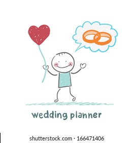 wedding planner keeps the ball in the form of a heart and think about the rings