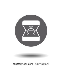 Wedding ring in gift box icon black on background. Ring with diamond as a symbol of love, a sign of a marriage proposal. Jewelry isolated. Vector illustration flat design.
