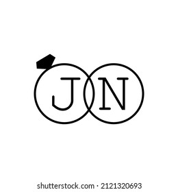 Wedding ring with initial JN simple logo.