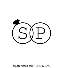 Wedding ring with initial SP simple logo.