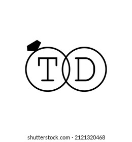 Wedding ring with initial TD simple logo.