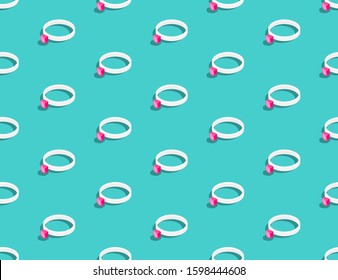 Wedding ring with pink diamond 3D isometric seamless pattern, Marriage concept poster and social banner post design illustration isolated on green background with copy space, vector eps 10