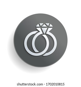 Wedding rings with diamond, icon. White paper symbol on gray round button or badge with shadow