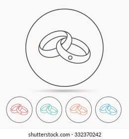 Wedding rings icon. Bride and groom jewelery sign. Linear circle icons.