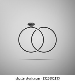 Wedding rings icon isolated on grey background. Bride and groom jewelery sign. Marriage icon. Diamond ring. Flat design. Vector Illustration