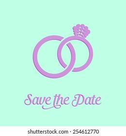 Wedding rings icon on mint background carved design