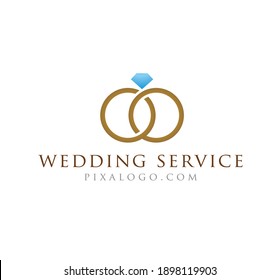 Wedding salon logo. With two rings and a gem symbol