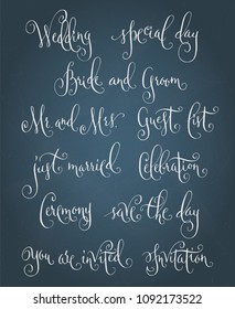 Wedding words. Hand written vector design elements set in white over textured muted blue background. Traditional calligraphy.