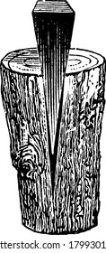 Wedge Splitting Wood, a wedge is a movable inclined plane, or two such planes united at their bases, vintage line drawing or engraving illustration.