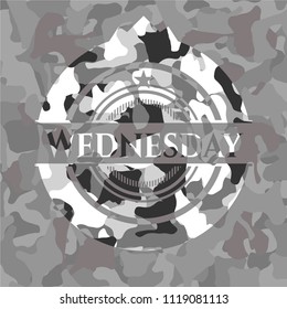 Wednesday on grey camouflage texture