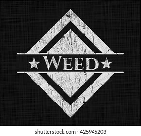 Weed chalk emblem written on a blackboard