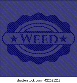 Emblema de maleza con fondo jean