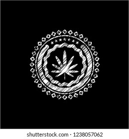 weed leaf icon drawn on blackboard