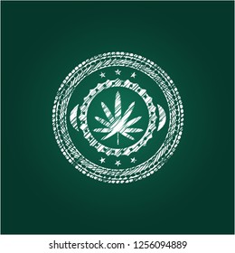 weed leaf icon drawn on blackboard