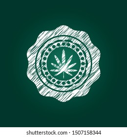 weed leaf icon drawn on blackboard