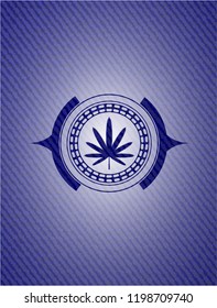 weed leaf icon inside badge with denim background