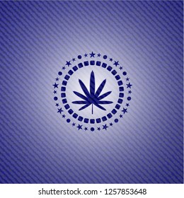 weed leaf icon inside badge with jean texture