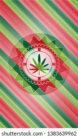 weed leaf icon inside christmas badge.
