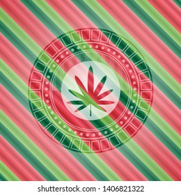 weed leaf icon inside christmas colors style badge.