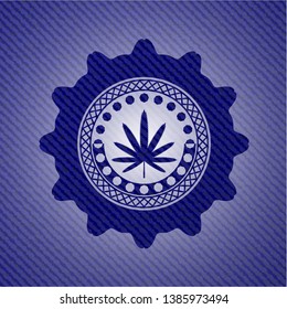 weed leaf icon inside denim background