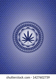 weed leaf icon inside emblem with denim high quality background